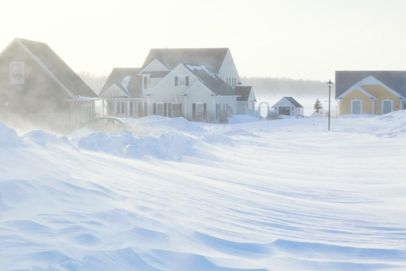 houses in a snowstorm