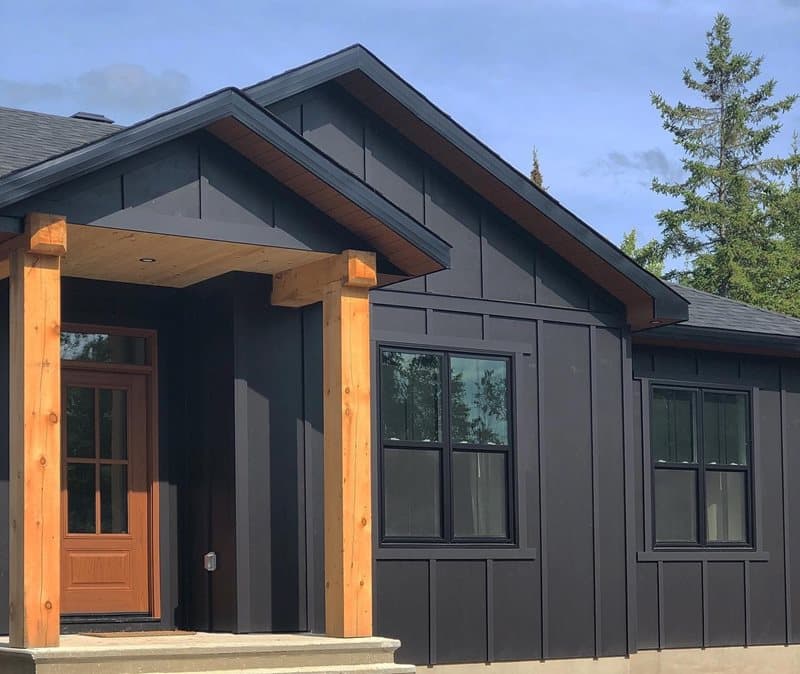Key steps for designing your dream house: House clad in black Hardie® Panel and Board and Batten Trim House clad in black Hardie® Panel and Board and Batten Trim