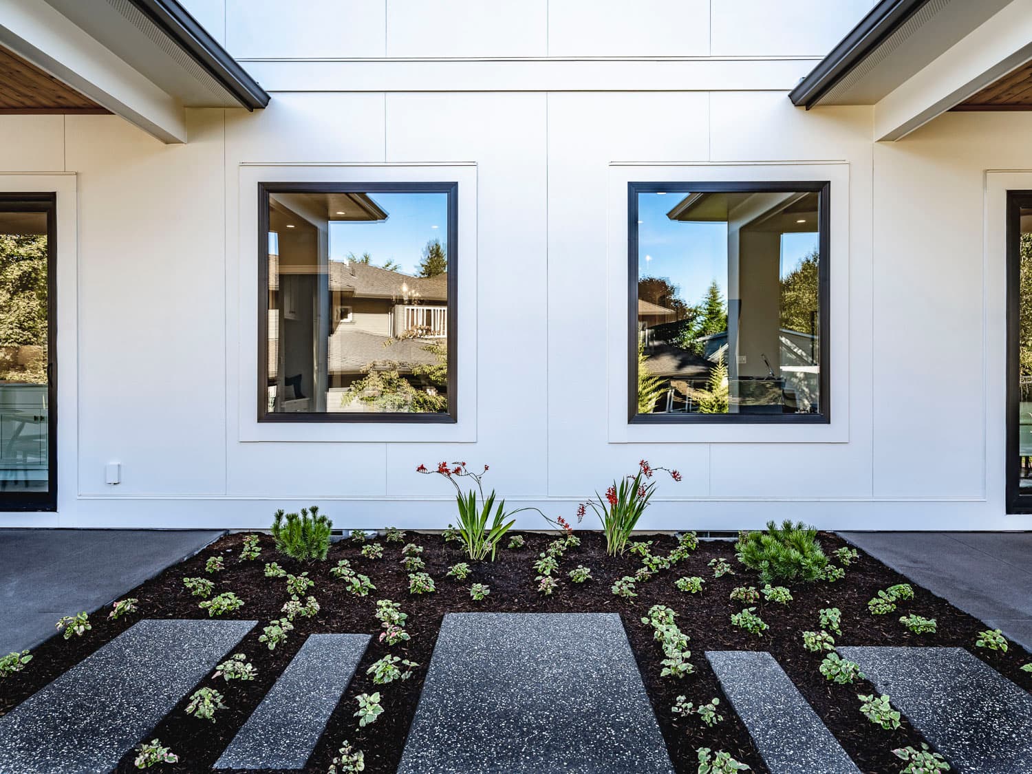 Curb Appeal 101: House clad with Hardie® Architectural Panel in Fine Sand House clad with Hardie® Architectural Panel in Fine Sand